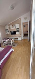 Postel nebo postele na pokoji v ubytování Apartman Jelena