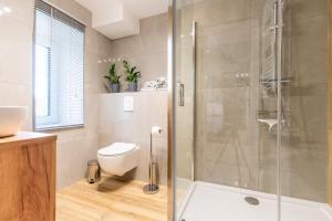 Kúpeľňa v ubytovaní Apartament przy Starówce