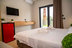 Postel nebo postele na pokoji v ubytování RiA BLU DELUXE HOTEL