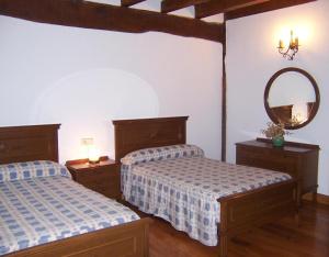 Postel nebo postele na pokoji v ubytování Casa Rural Barbonea