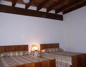 Postel nebo postele na pokoji v ubytování Casa Rural Barbonea