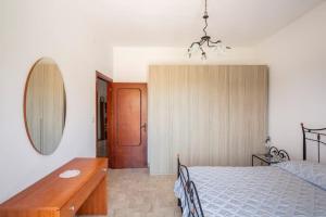 Postel nebo postele na pokoji v ubytování guesthouseminturnoit Lucia Sparagna