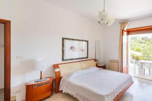 Postel nebo postele na pokoji v ubytování guesthouseminturnoit Lucia Sparagna