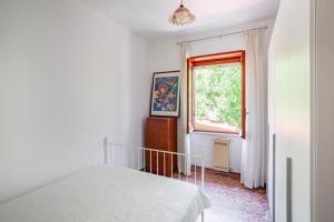 Postel nebo postele na pokoji v ubytování guesthouseminturnoit Lucia Sparagna