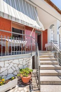 Balkón nebo terasa v ubytování guesthouseminturnoit Lucia Sparagna + 28 fotografií