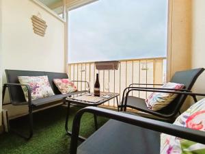 Khu vực ghế ngồi tại T2 cozy avec parking, terrasse - Severine