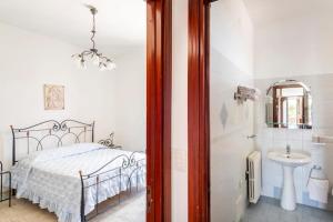 Postel nebo postele na pokoji v ubytování guesthouseminturnoit Lucia Sparagna