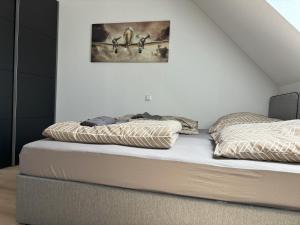 Ένα ή περισσότερα κρεβάτια σε δωμάτιο στο Apartments Leimen