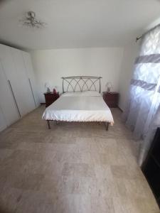 Postel nebo postele na pokoji v ubytování guesthouseminturnoit Lucia Sparagna