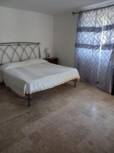 Postel nebo postele na pokoji v ubytování guesthouseminturnoit Lucia Sparagna