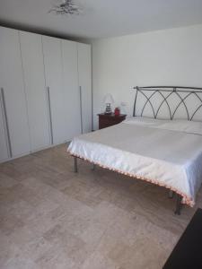 Postel nebo postele na pokoji v ubytování guesthouseminturnoit Lucia Sparagna