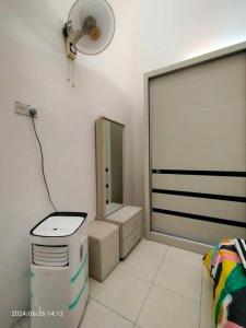 a white room with a window and a mirror at Pa&Ma HomeStay Kulim II 3R2B fully aircond wifi netflix in Kulim