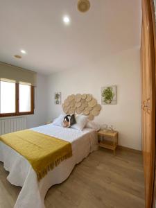 Postel nebo postele na pokoji v ubytování Casa RAS + 3 fotografie