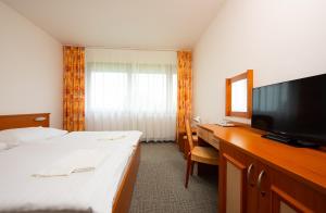 Postel nebo postele na pokoji v ubytování Hotel SOREA TITRIS