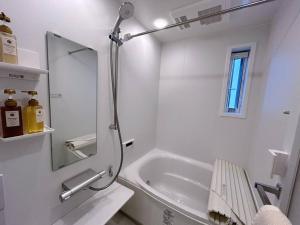 Ванная комната в 站前2分 白色浪漫小屋 精致独栋 最多可住4人 免费自行车 有停车位
