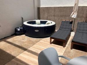 Posezení v ubytování Jable suites apartamentos de lujo en el centro