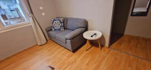 A seating area at Closer "Egnatia Apartment 4"