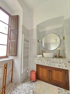 a bathroom with a sink and a mirror at Maison d Americain a Figarella au Cap Corse in Santa-Maria-di-Lota +42 photos