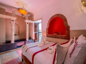 Postel nebo postele na pokoji v ubytování Riad Zehar & Spa Marrakech