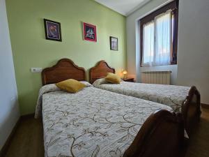 Ένα ή περισσότερα κρεβάτια σε δωμάτιο στο La Casina en Sebreño 13A05
