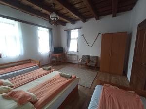 Posteľ alebo postele v izbe v ubytovaní Heni Vendégháza