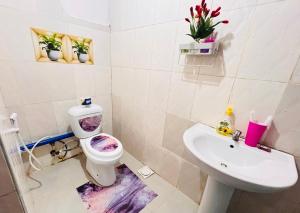 Ένα μπάνιο στο Beach Studio Apartment