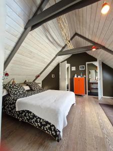 Ένα ή περισσότερα κρεβάτια σε δωμάτιο στο LONGERE DE NIVINEN