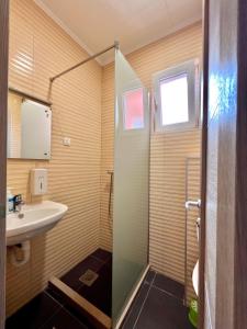 Koupelna v ubytování Hotel Nur + 37 fotografií