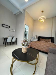 מיטה או מיטות בחדר ב-JAVA Hostel Tumpak Sewu