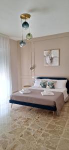 a bedroom with a large bed in a room at Russo Apartment in Termoli