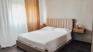 Postel nebo postele na pokoji v ubytování Ampio e Raffinato Vicino Mare e Città + 12 fotografií