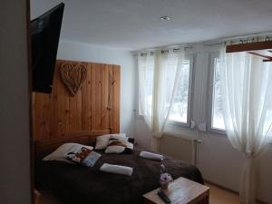 Postel nebo postele na pokoji v ubytování Domaine Des Hauts Viaux