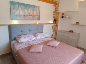 Postel nebo postele na pokoji v ubytování Apartment Igralište Mirakul