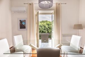A seating area at Piazza Marina Suite By DomuSicily