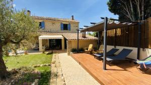 Κήπος έξω από το Mazet des Balestiés cœur Luberon 120 m2 6 pers avec piscine