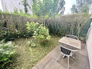 Κήπος έξω από το Appartement avec 2 jardins privés