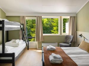Postel nebo postele na pokoji v ubytování Hardanger Guesthouse