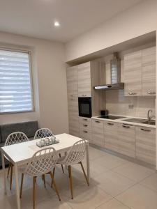 Η κουζίνα ή μικρή κουζίνα στο Appartamento firenze
