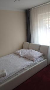 Ένα ή περισσότερα κρεβάτια σε δωμάτιο στο U Reja