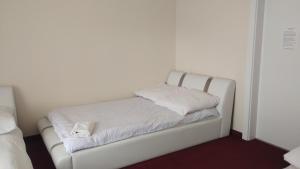 Ένα ή περισσότερα κρεβάτια σε δωμάτιο στο U Reja