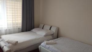 Ένα ή περισσότερα κρεβάτια σε δωμάτιο στο U Reja