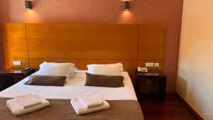 Katil atau katil-katil dalam bilik di Flag Hotel Barcelos