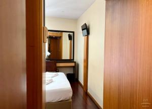 Katil atau katil-katil dalam bilik di Flag Hotel Barcelos