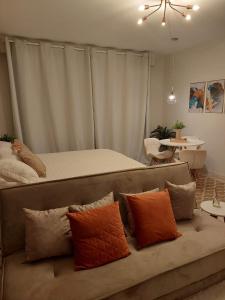 Χώρος καθιστικού στο Local aconchegante central