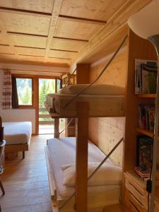 Postel nebo postele na pokoji v ubytování Casa Focobon - presso Sussy residence