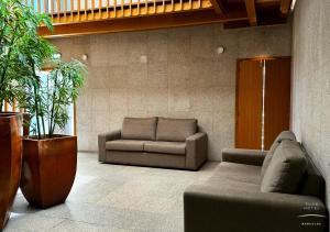 Ruang duduk di Flag Hotel Barcelos