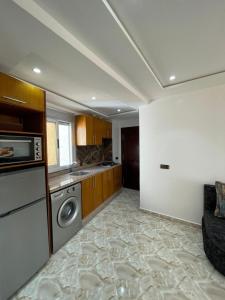 Kuchyň nebo kuchyňský kout v ubytování Hiba apartments