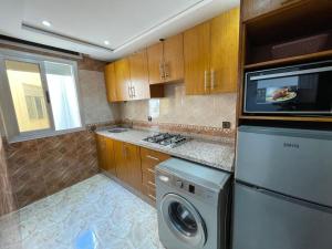 Kuchyň nebo kuchyňský kout v ubytování Hiba apartments