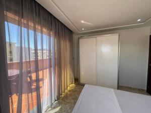 Postel nebo postele na pokoji v ubytování Hiba apartments
