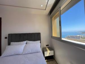 Postel nebo postele na pokoji v ubytování Hiba apartments